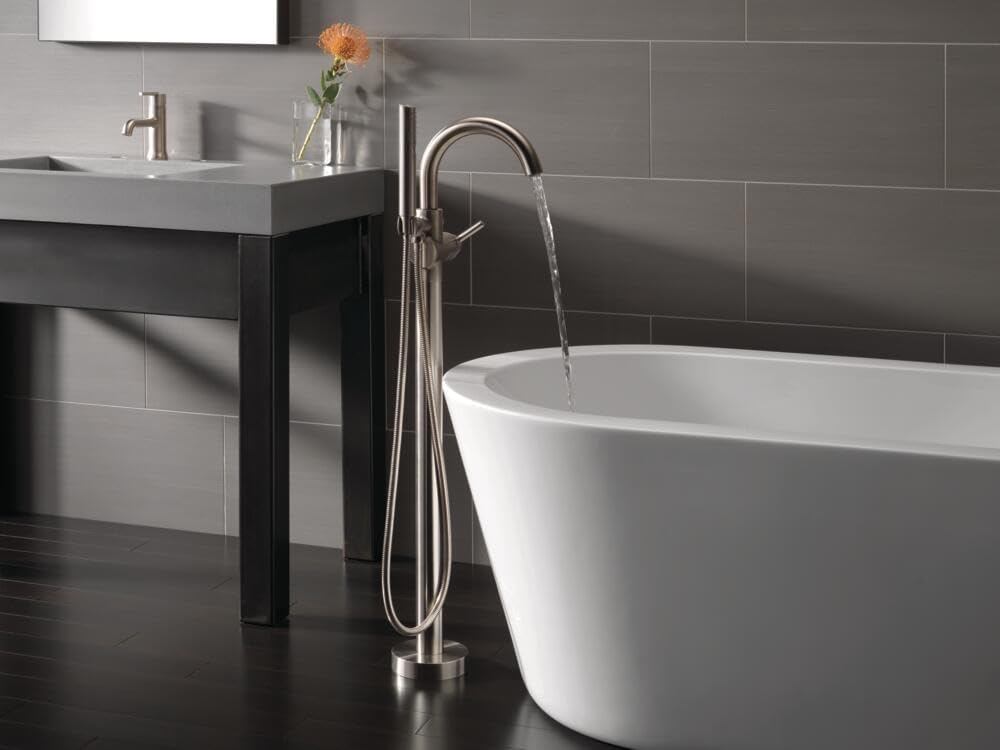 Delta Faucet Trinsic Floor Mount Tub Filler - Freestanding Roman Tub Spout with Handheld Shower - Flexible Shower Hose - Double Check Valves - Stainless, T4759-SSFL (Rough Sold Separately)