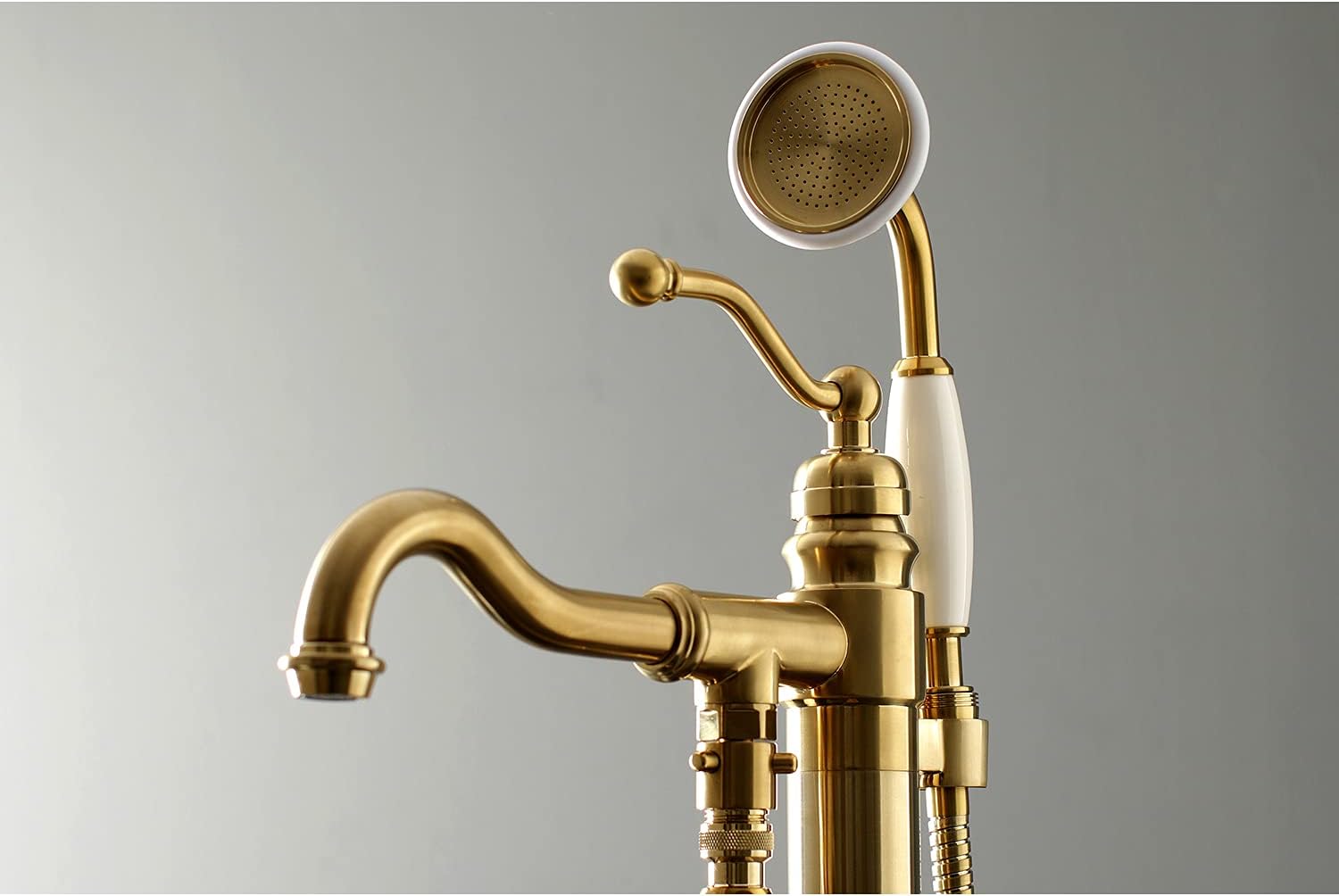 Kingston Brass KS7137ABL Freestanding Roman Tub Filler With Hand Shower, Brushed Brass