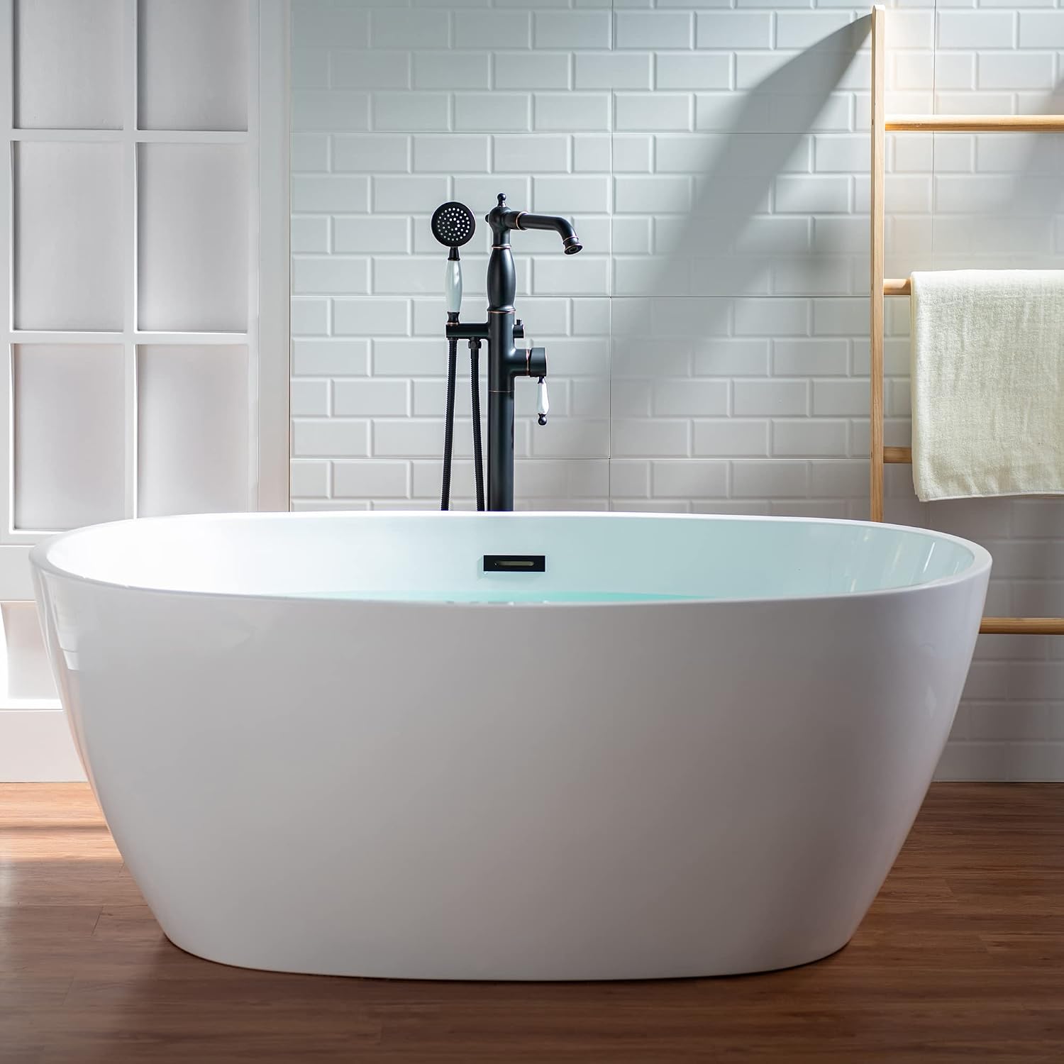 WOODBRIDGE Contemporary Single Handle Floor Mount Freestanding Tub Filler Faucet with Hand Shower in Oil Rubbed Bronze Finish