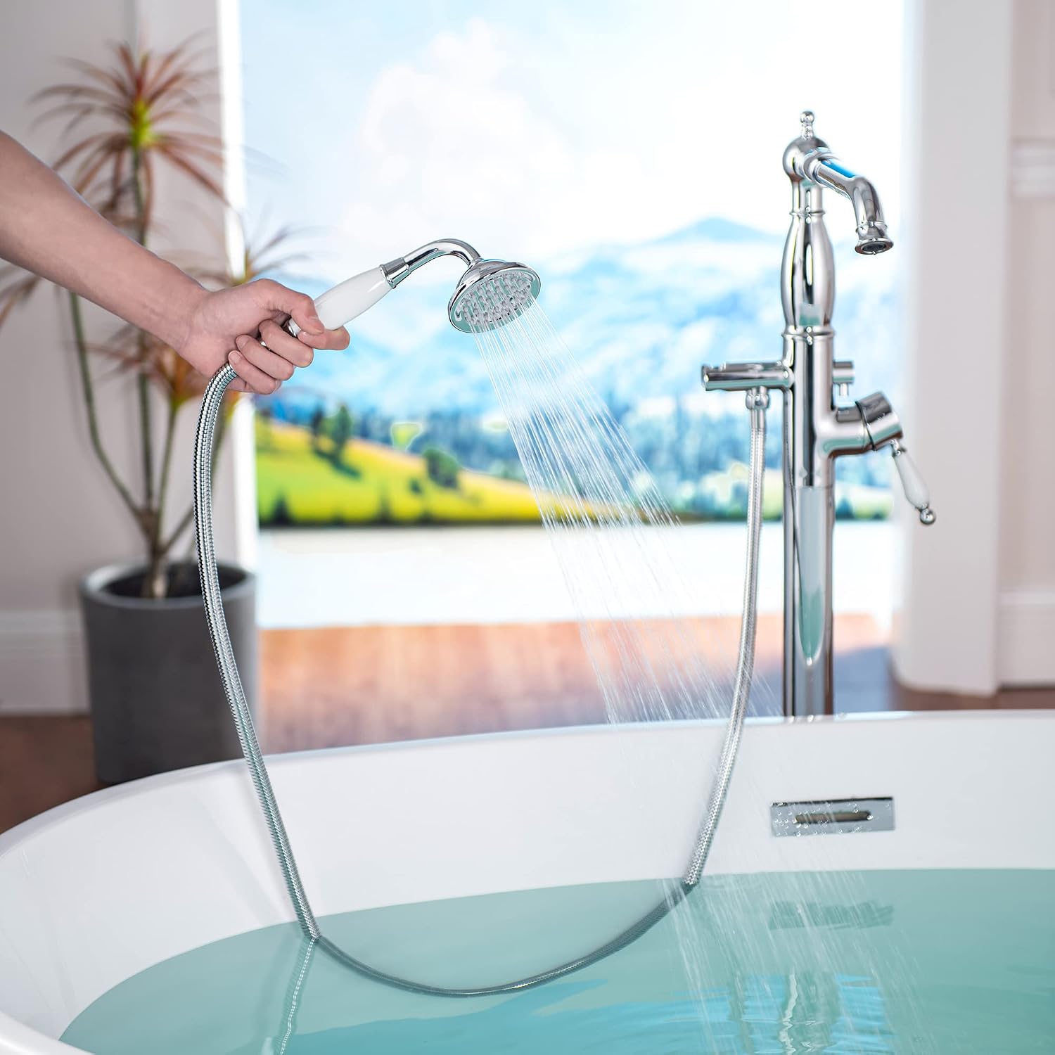 WOODBRIDGE Contemporary Single Handle Floor Mount Freestanding Tub Filler Faucet with Hand Shower in Chrome Finish
