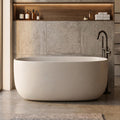 47' Stone Resin Freestanding Soaking Bathtub – Solid Surface Oval Tub for Small Bathroom, Modern Stand Alone Deep Soaking Tub with Slotted Overflow and Drain, Beige