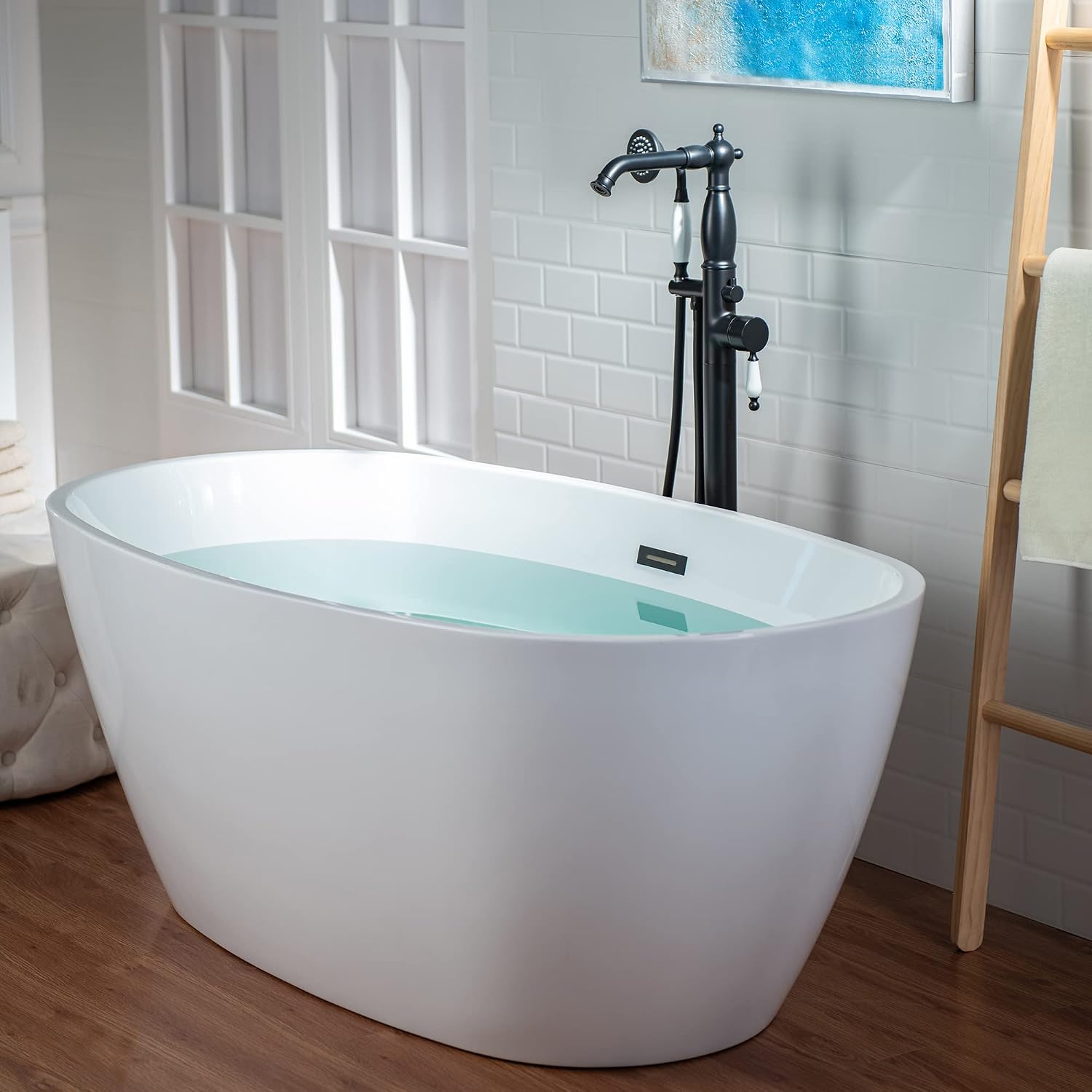 WOODBRIDGE Contemporary Single Handle Floor Mount Freestanding Tub Filler Faucet with Hand Shower in Matte Black Finish