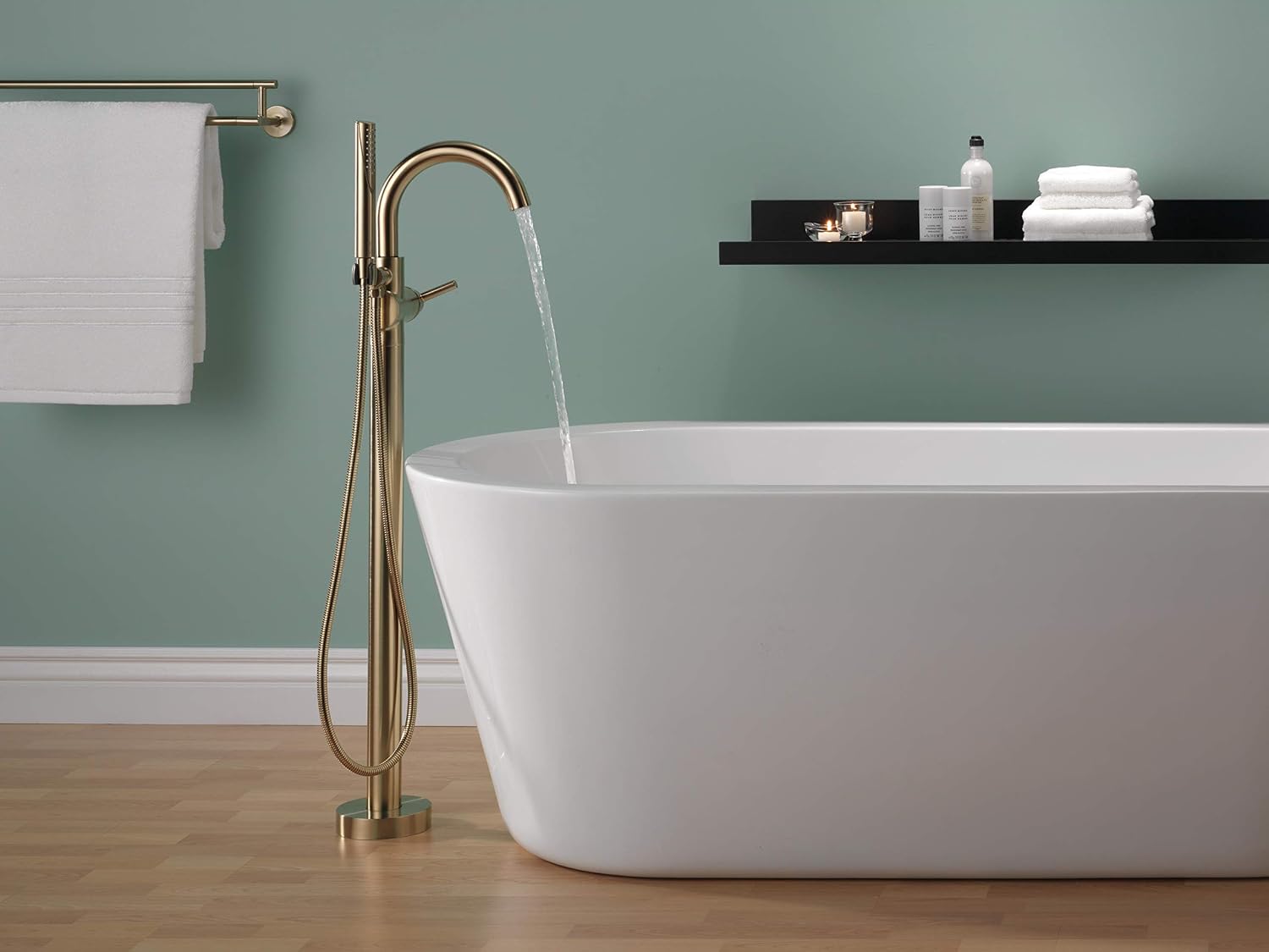 Delta Faucet Trinsic Floor Mount Tub Filler - Freestanding Roman Tub Spout with Handheld Shower - Flexible Shower Hose - Double Check Valves - Champagne Bronze, T4759-CZFL (Rough Sold Separately)