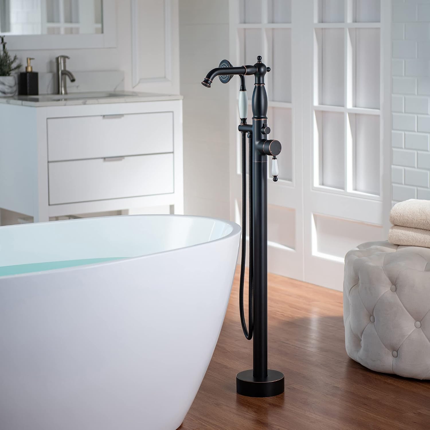 WOODBRIDGE Contemporary Single Handle Floor Mount Freestanding Tub Filler Faucet with Hand Shower in Oil Rubbed Bronze Finish