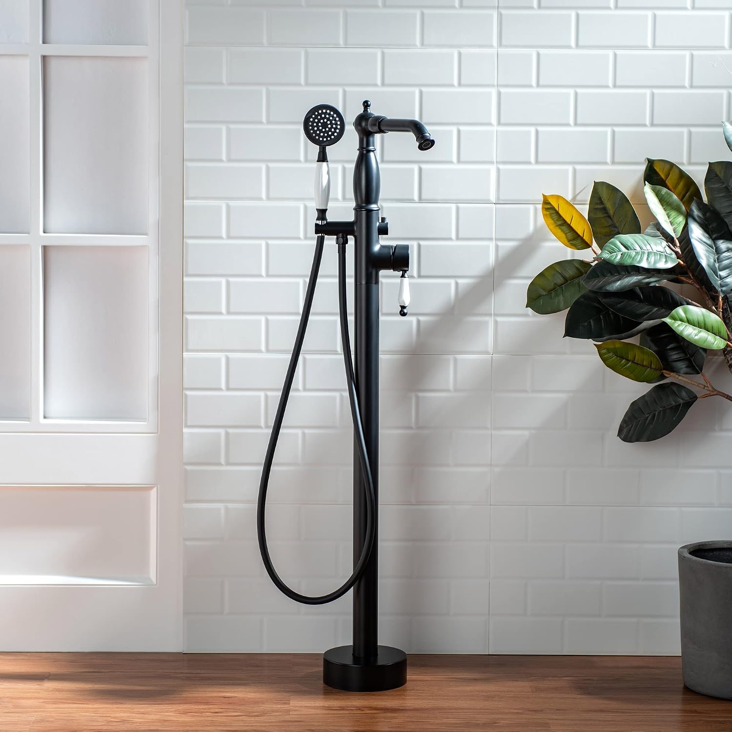 WOODBRIDGE Contemporary Single Handle Floor Mount Freestanding Tub Filler Faucet with Hand Shower in Matte Black Finish