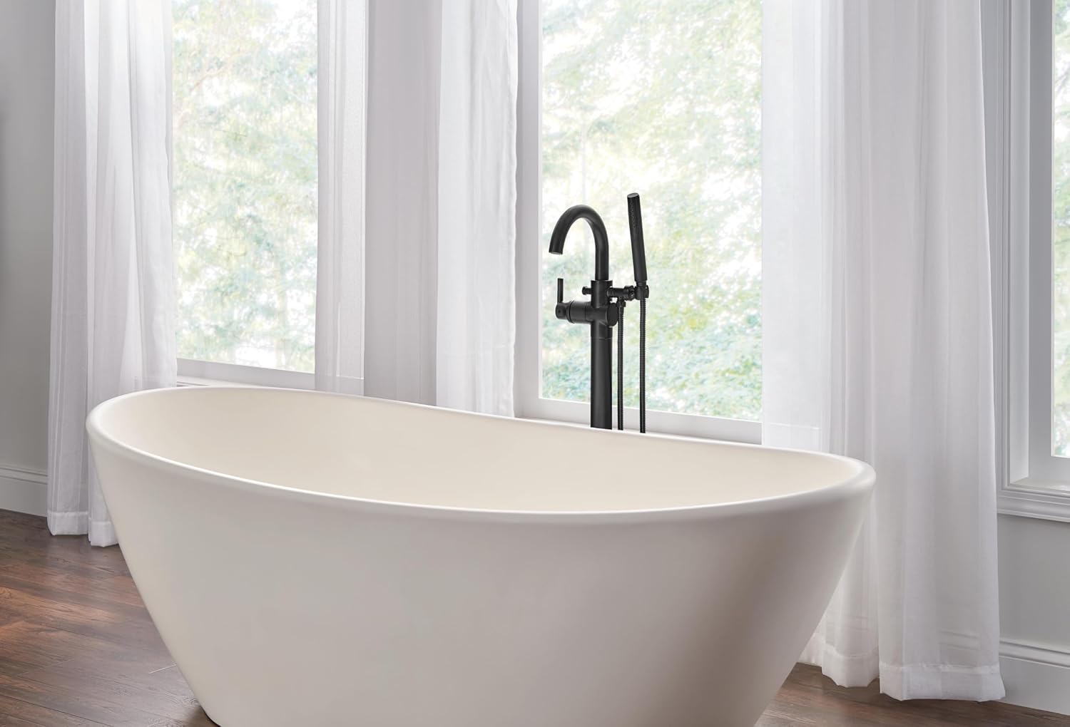 Delta Faucet Trinsic Floor Mount Tub Filler - Freestanding Roman Tub Spout with Handheld Shower - Flexible Shower Hose - Double Check Valves - Matte Black, T4759-BLFL (Rough Sold Separately)