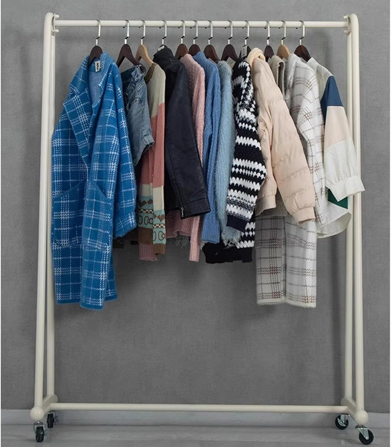 Heavy duty Garment rack Rolling Clothing Rack With Wheels Commercial Heavy Duty Clothes Rail For Hanging Clothes Single Rod Coat Rack For Bedroom And Boutiques Portable Clothes Organ (Black 100X40X16