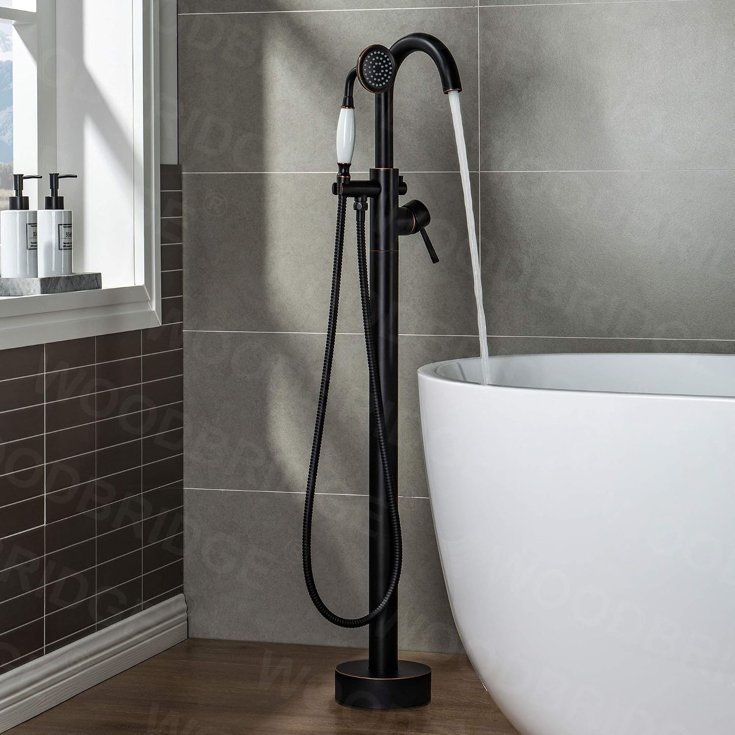 WOODBRIDGE Contemporary Single Handle Floor Mount Freestanding Tub Filler Faucet with Hand Shower in (Oil Rubbed Bronze) Finish,F0010-ORBVT