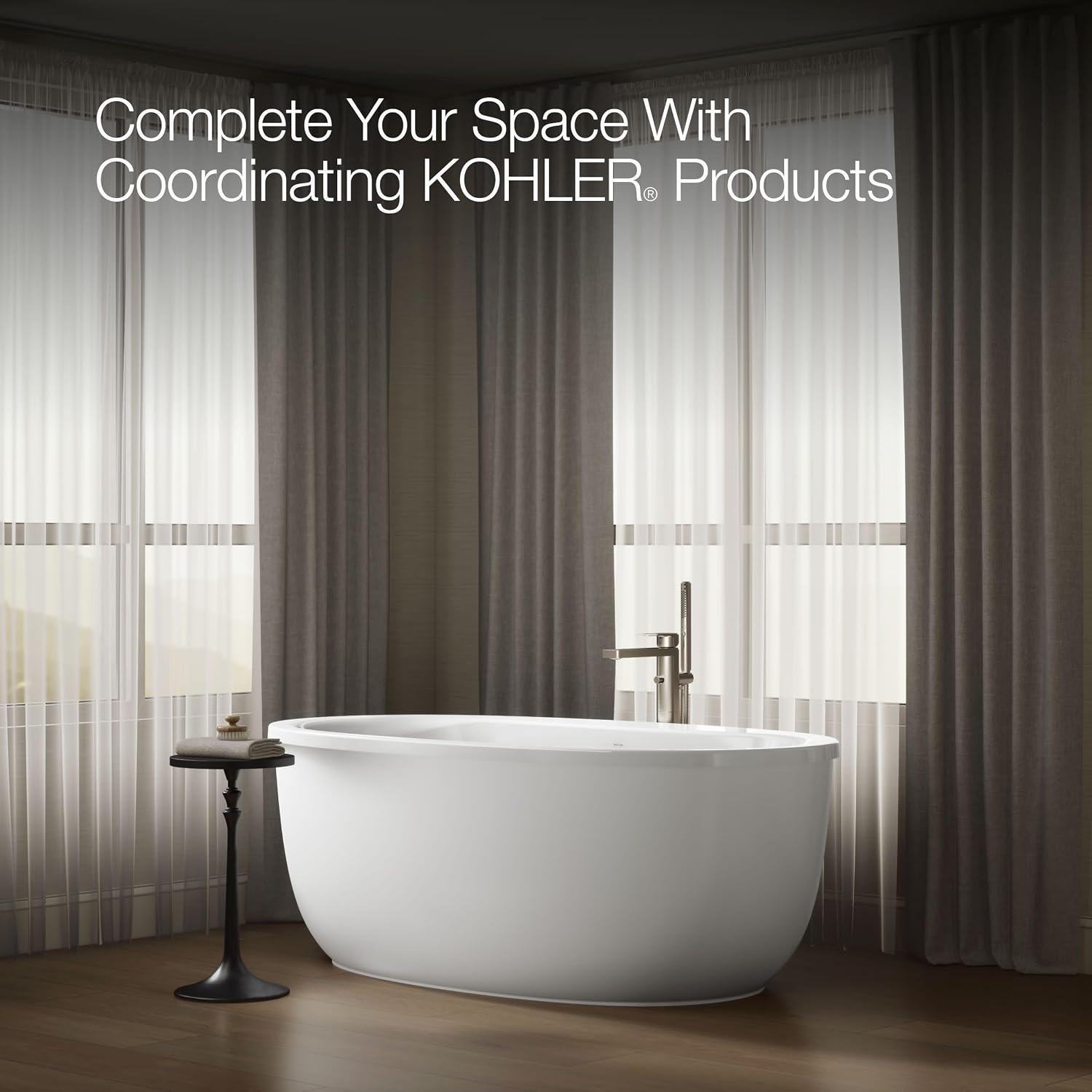 Kohler 6369-0 Sunstruck® 65-1/2' x 35-1/2' freestanding bath with fluted shroud, White